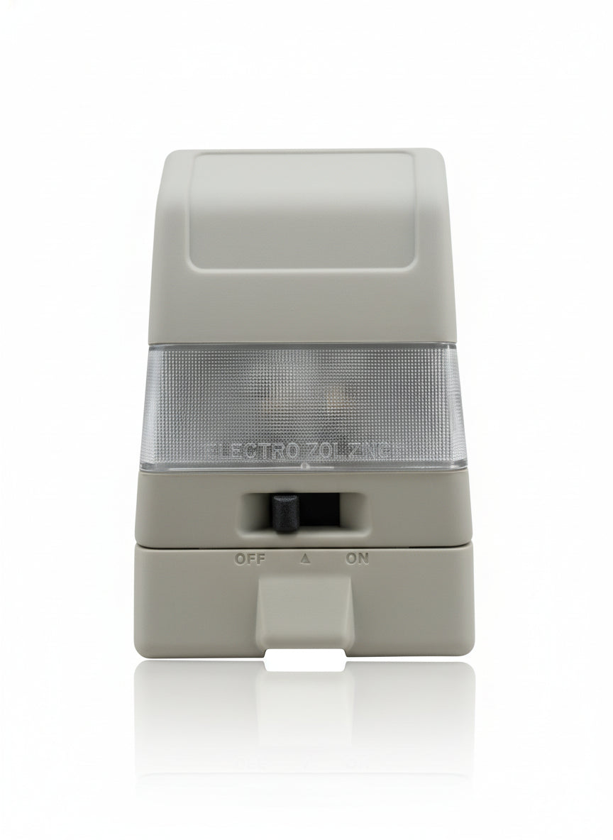 Light switch on a beige wall