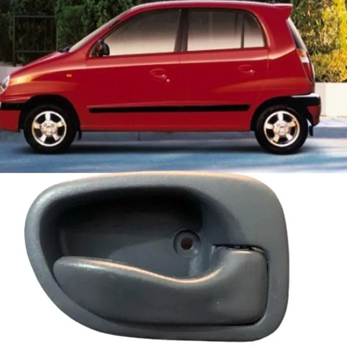 Red car with a gray car door handle on a white background