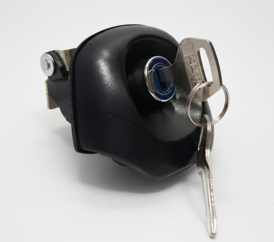 Car ignition switch with key on a white background