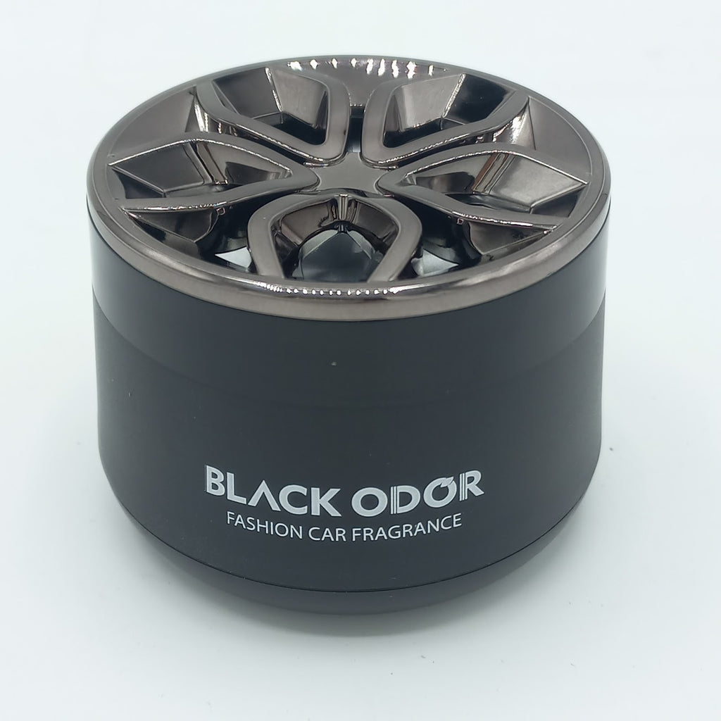 Black odor car fragrance with metallic top on a white background