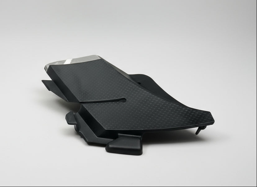 Honda car hood hinge cover with packaging on a gray background