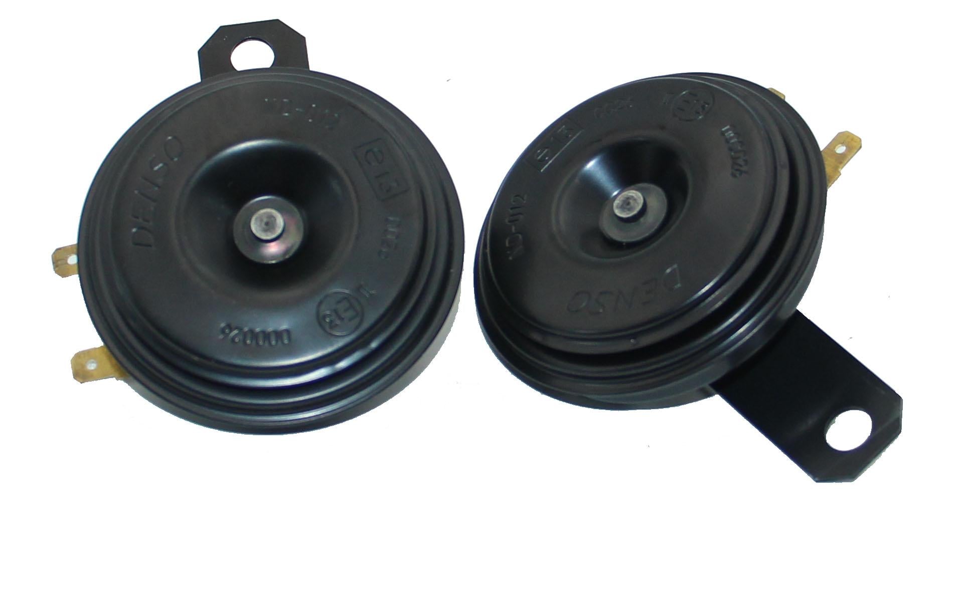 Two black car horns on a white background