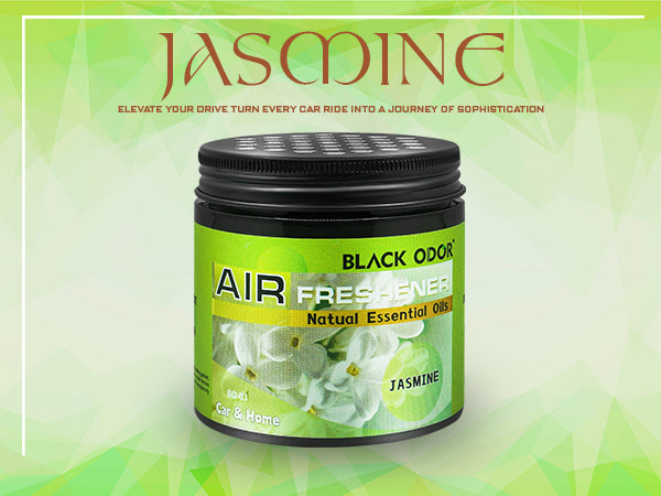 Air freshener jar with jasmine scent on a green background