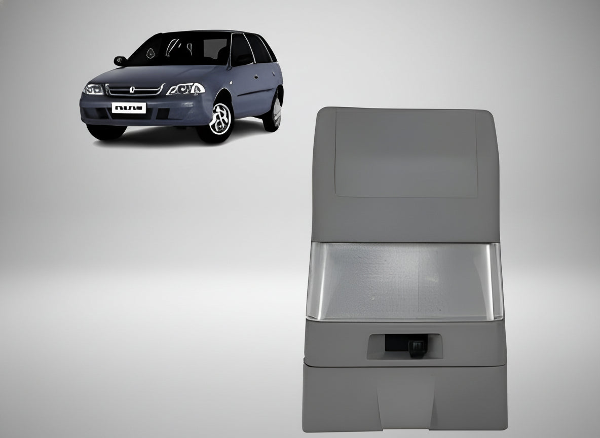 Gray car boot lid on a white background with a car partially visible.