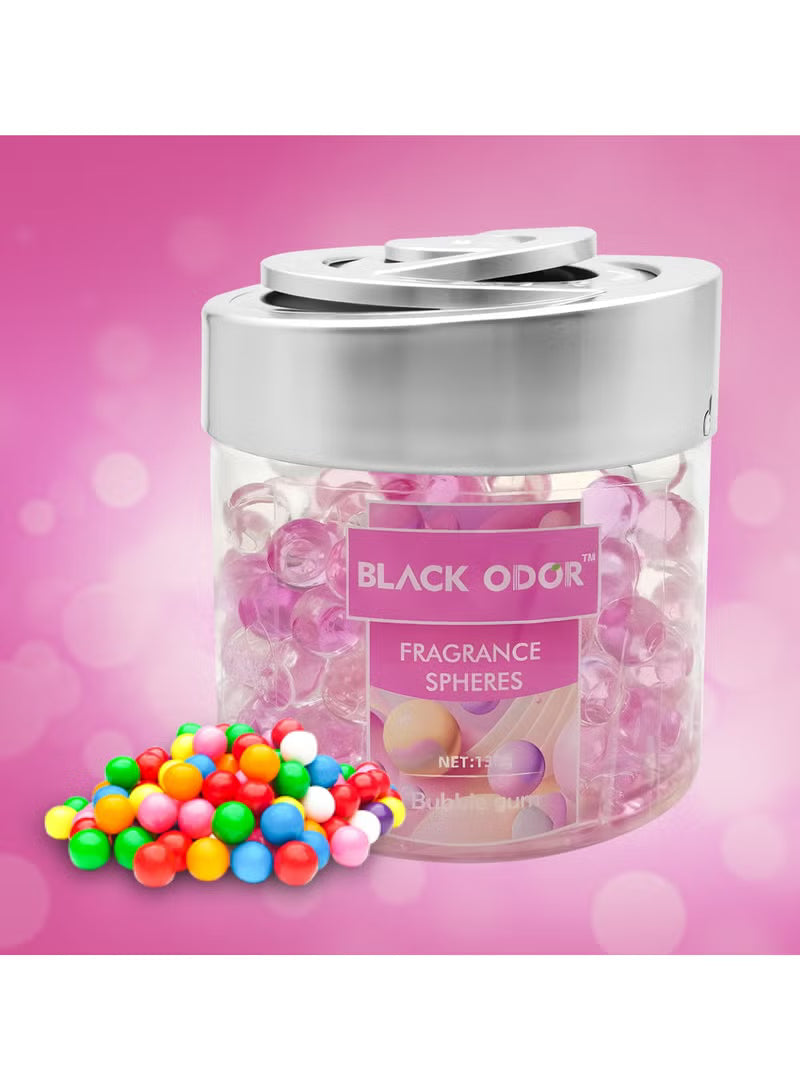 Jar of Black Odor fragrance spheres with colorful spheres on a pink background
