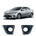 Silver Toyota Altis car with two car bumper covers on a white background