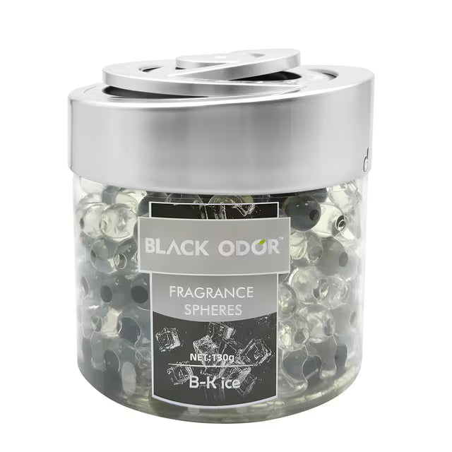 Jar of Black Odor fragrance spheres with a silver lid on a white background