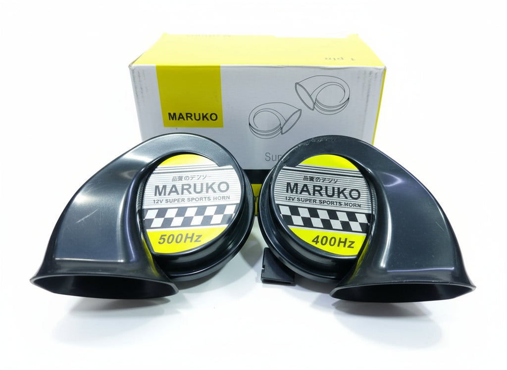 Two Maruko speaker horns with a box in the background on a wooden surface.