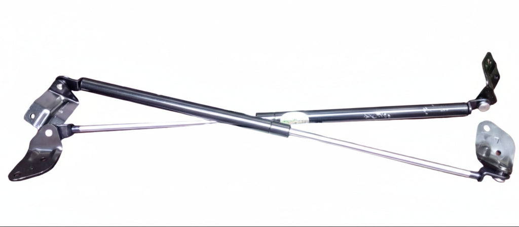 Two metal shock absorbers on a wooden table with 'Diggi shock RA1000' text above.