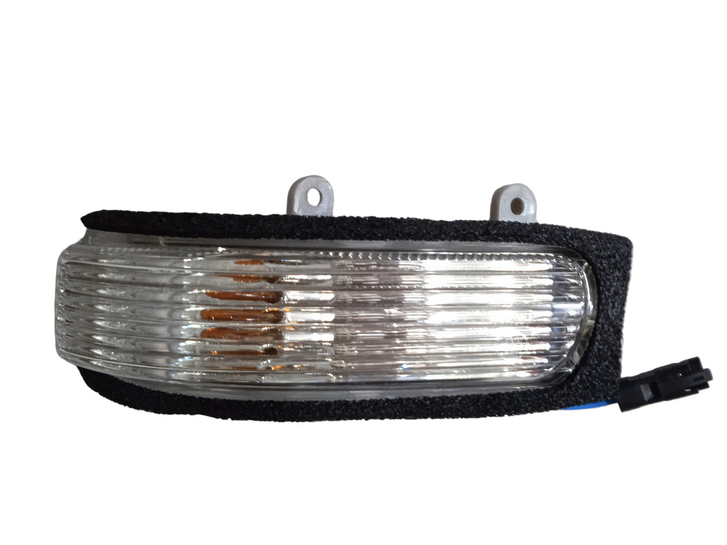 Car side marker light on a white background with text