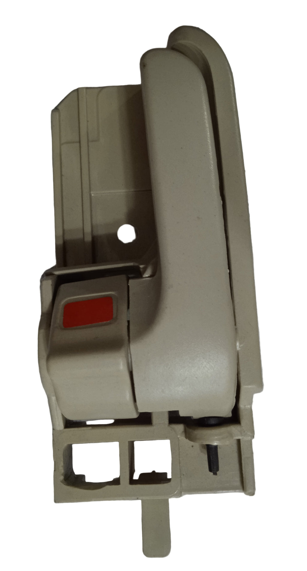 Beige window handle on a textured surface with text