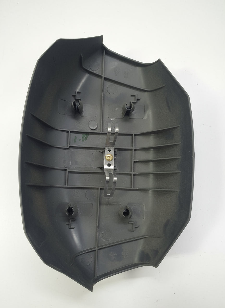 Black plastic car fender on a white background