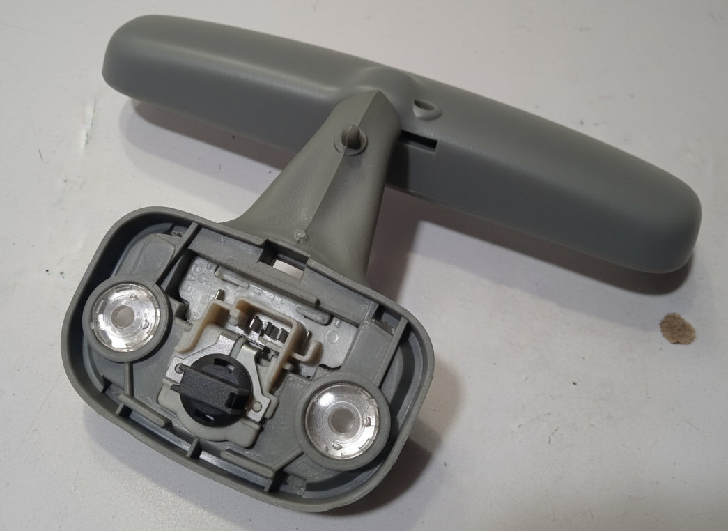 Gray car door handle on a white background