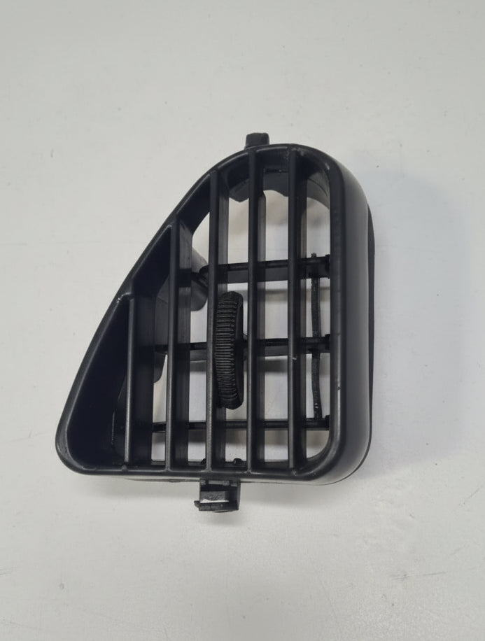 Black plastic grille or filter on a white background