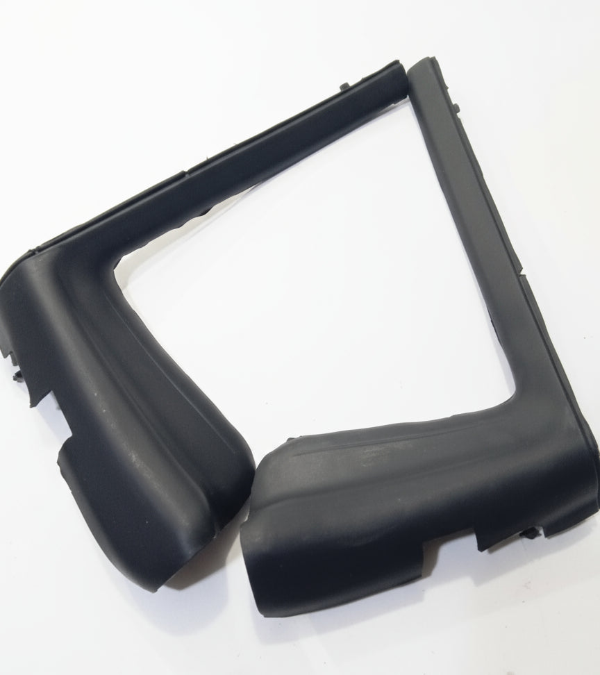 Black rubber bumper on a white surface