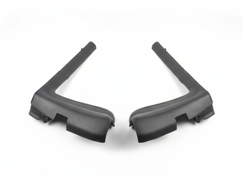 Black car mirror cover on a white surface