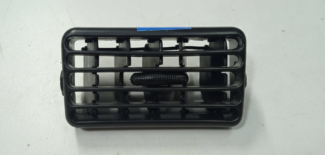 Black plastic grille on a white background