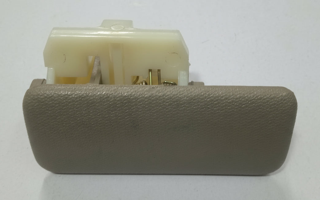 Car interior component with beige cover on a white background