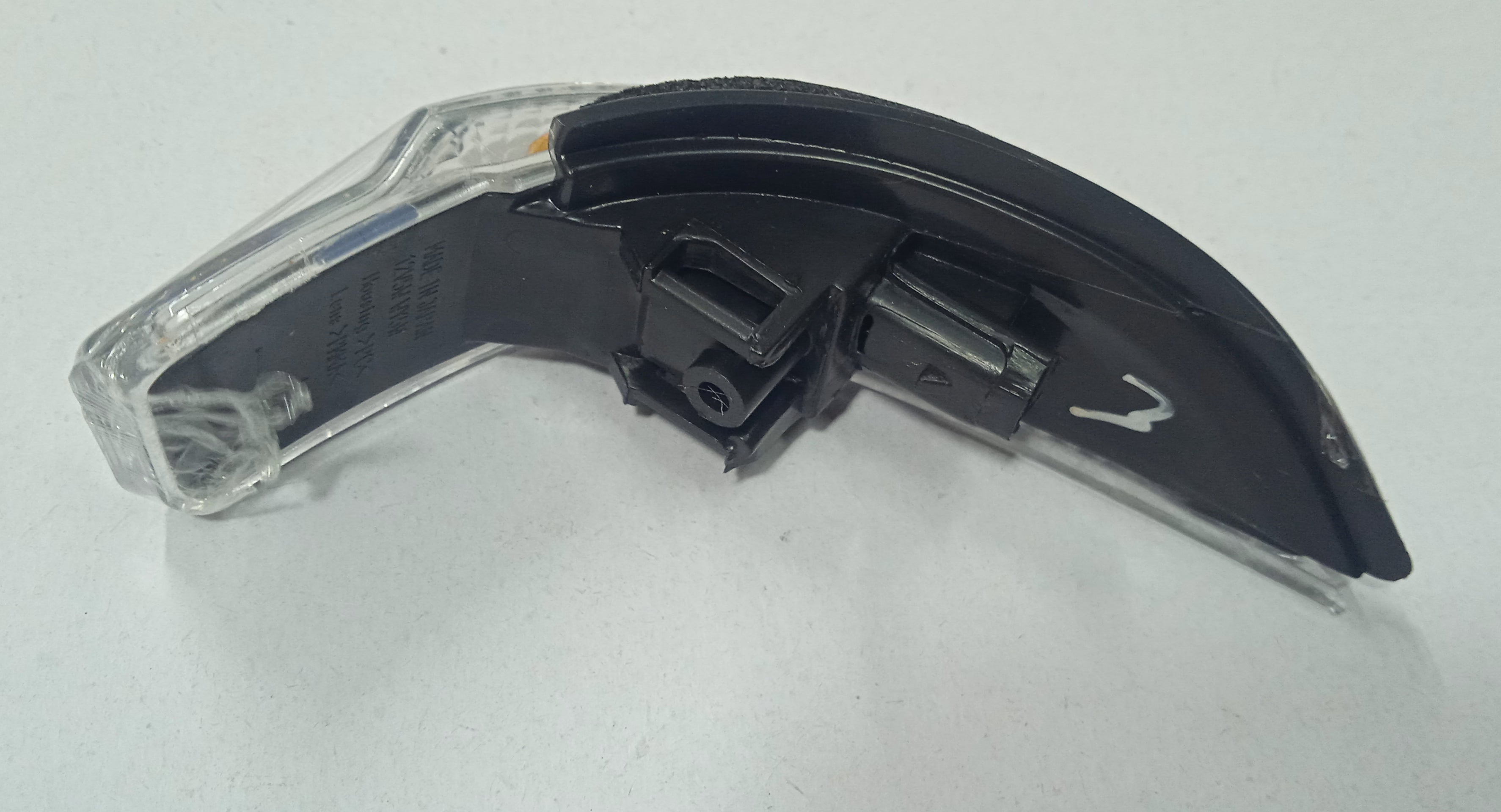 Car headlight cover on a white background