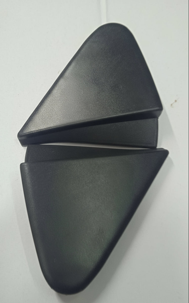 Black triangular object on a white background