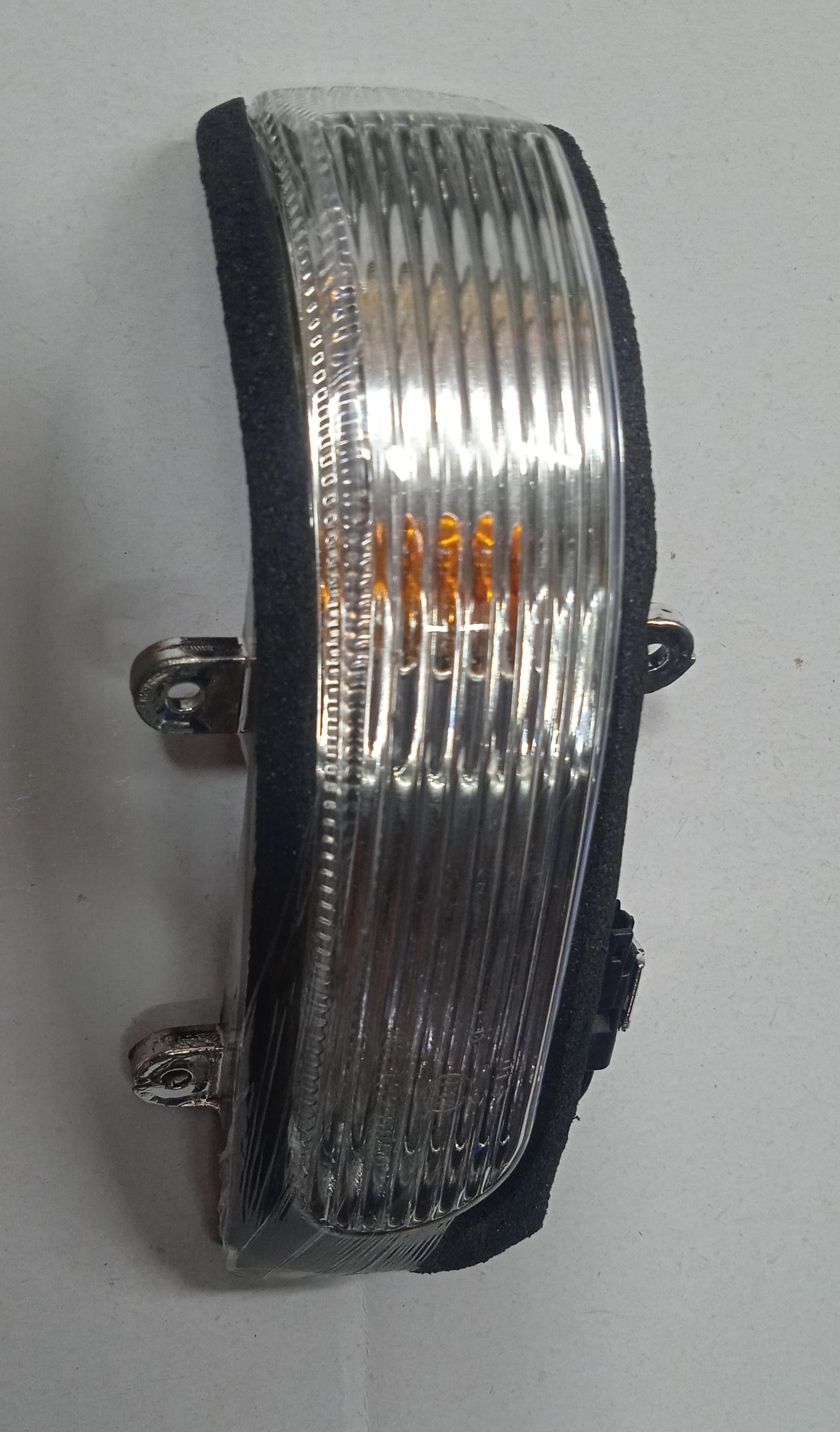 Car headlight on a white background