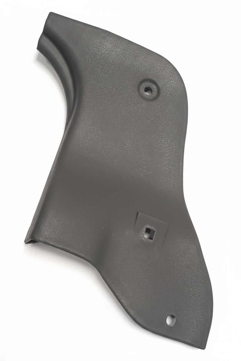 Black plastic gun grip on a tiled floor