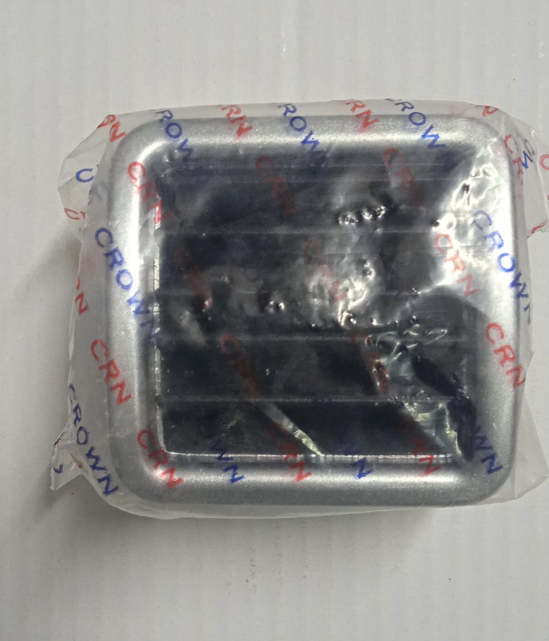 Small electronic component package with 'Crown' branding on a white background