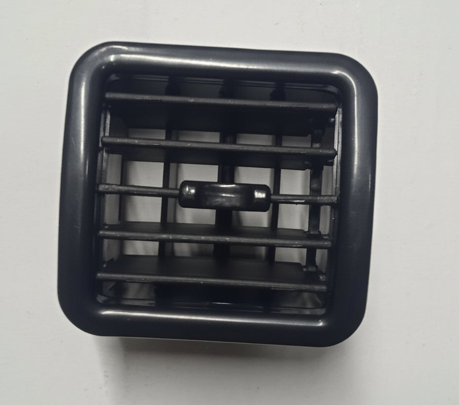 Black plastic vent on a white background