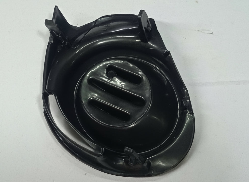 Black plastic component on a white background