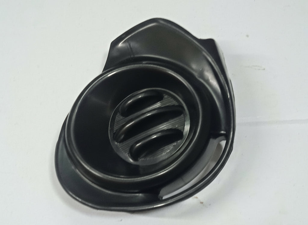 Black mechanical component on a white background