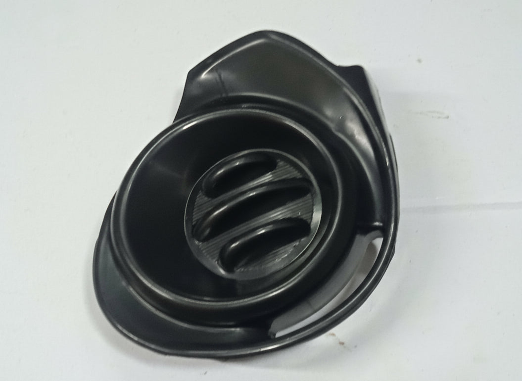 Black mechanical component on a white background