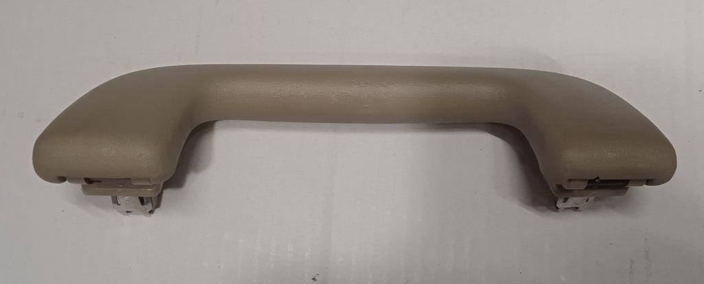 Brown car door handle on a white background