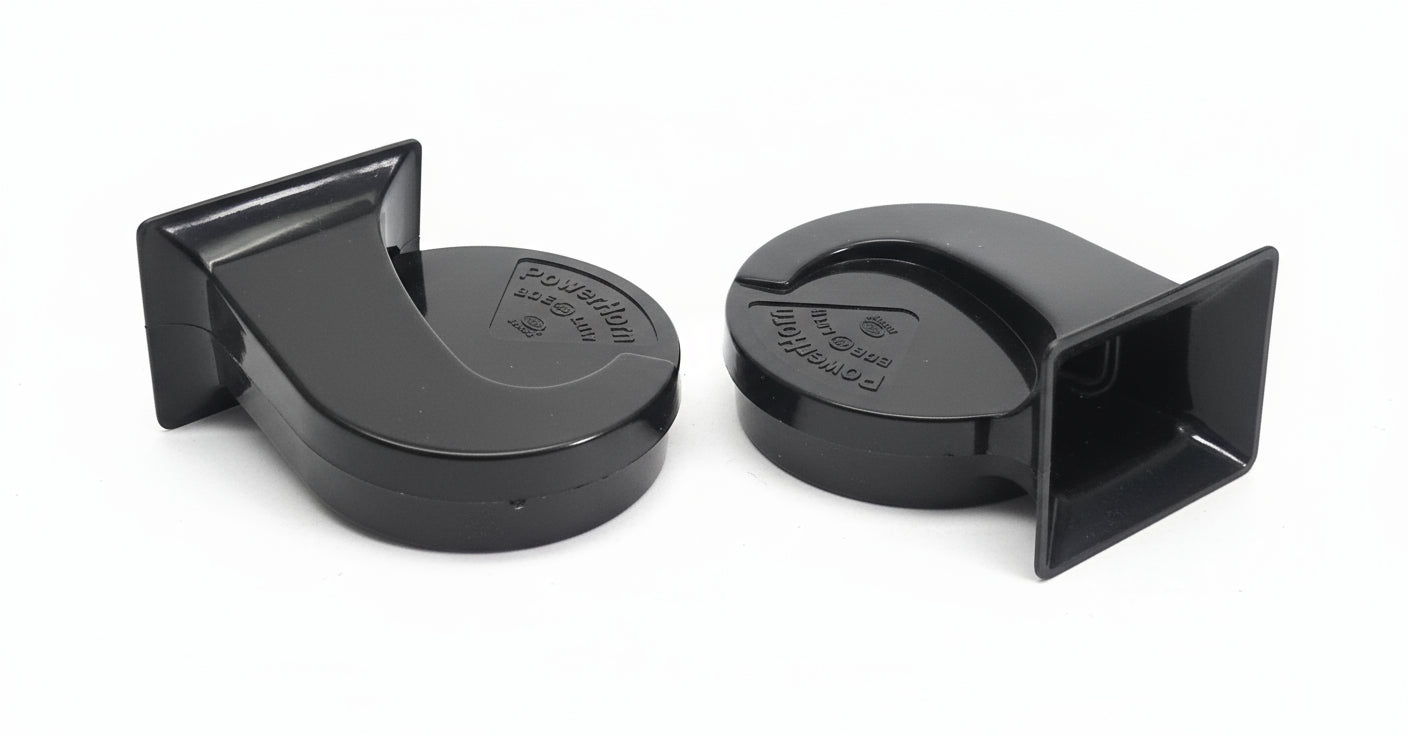 Two black power horn nozzles on a white background