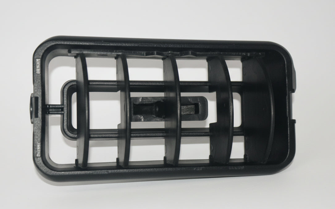 Black plastic grid on a light gray background