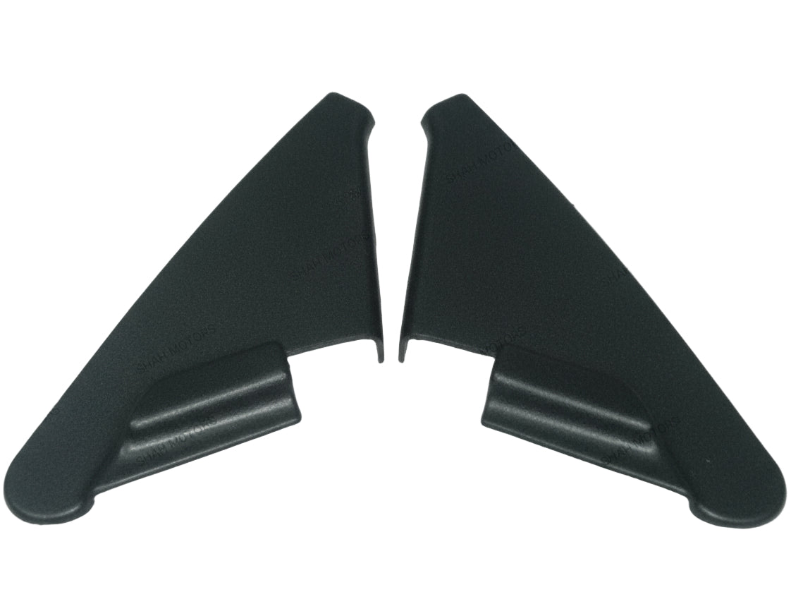 Two black plastic car spoilers on a white background