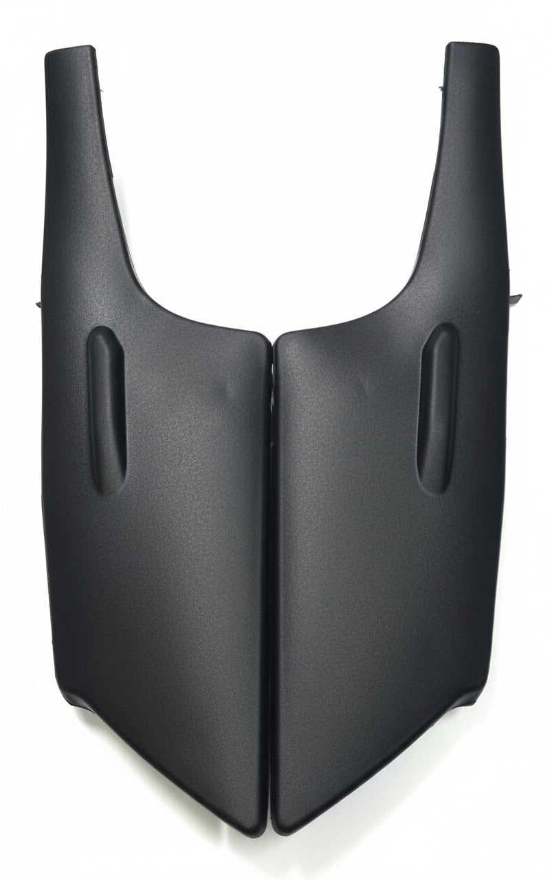 Black plastic car fender on a white background