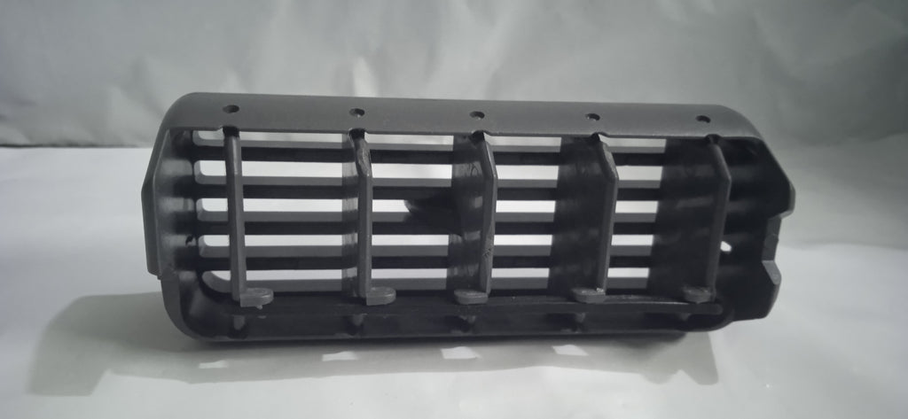 Black metal grille on a white background