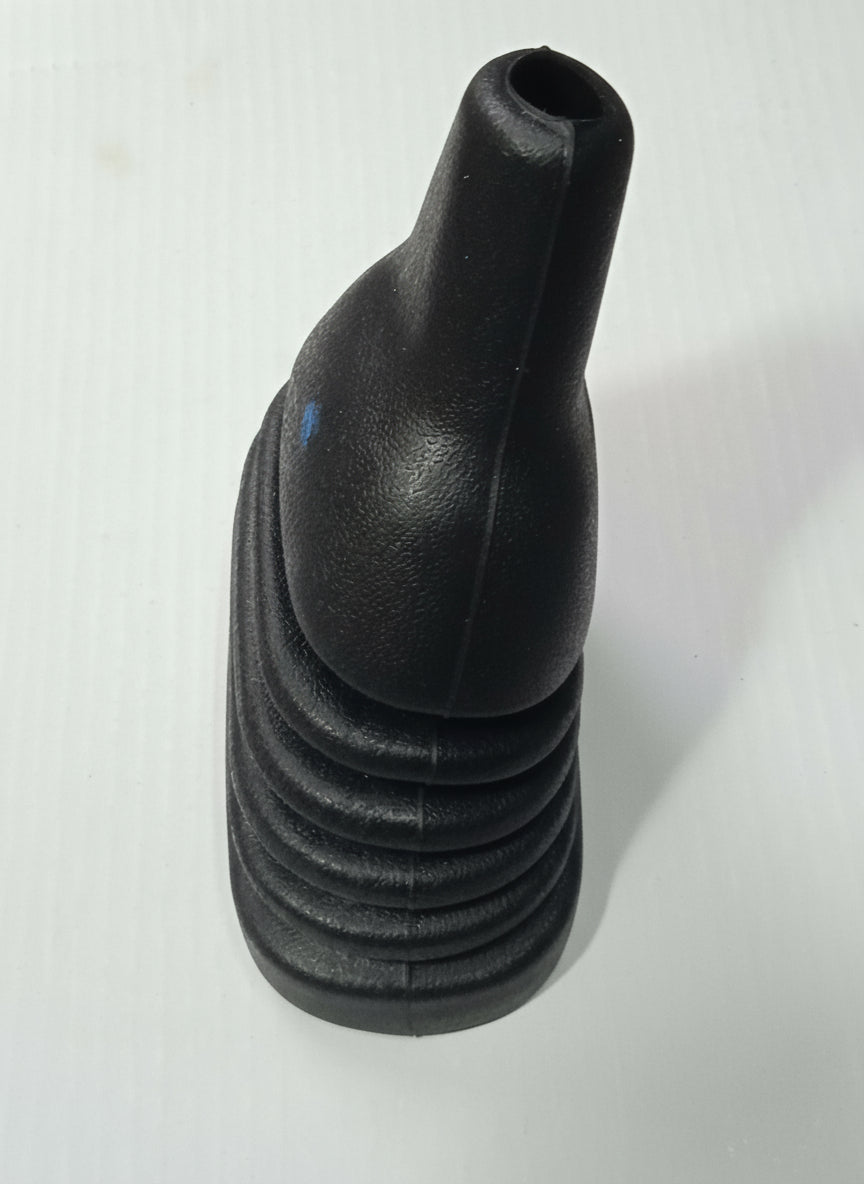 Black rubber boot on a white background