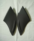 Two black car side mirrors on a white background