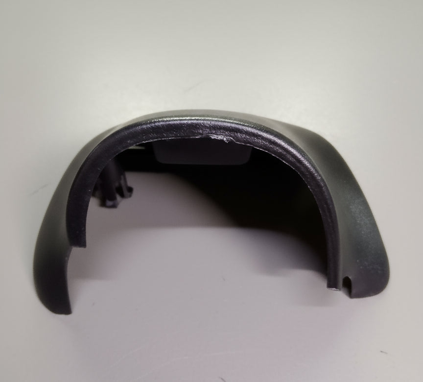 Metallic object on a textured surface