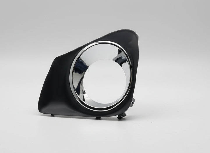 Stainless steel bowl inside a purple pet carrier on a tiled floor