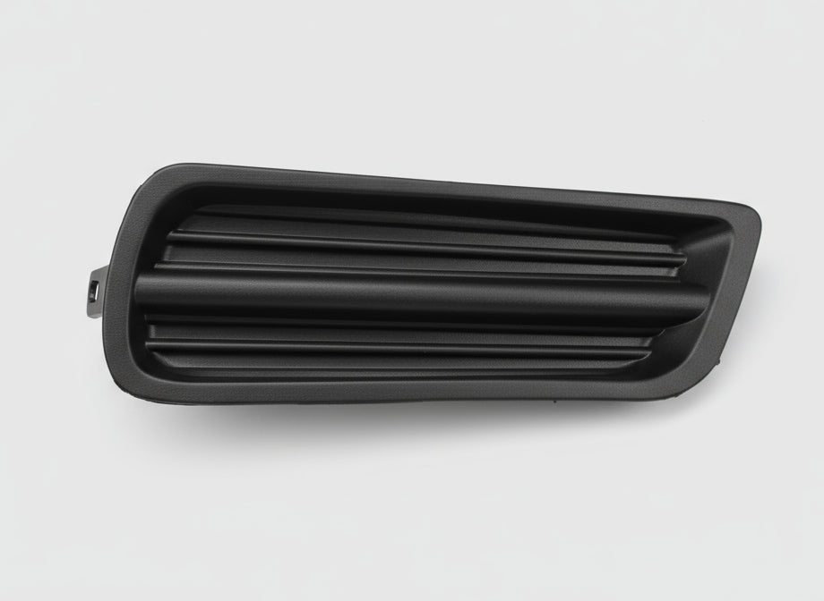 Black plastic component on a gray background