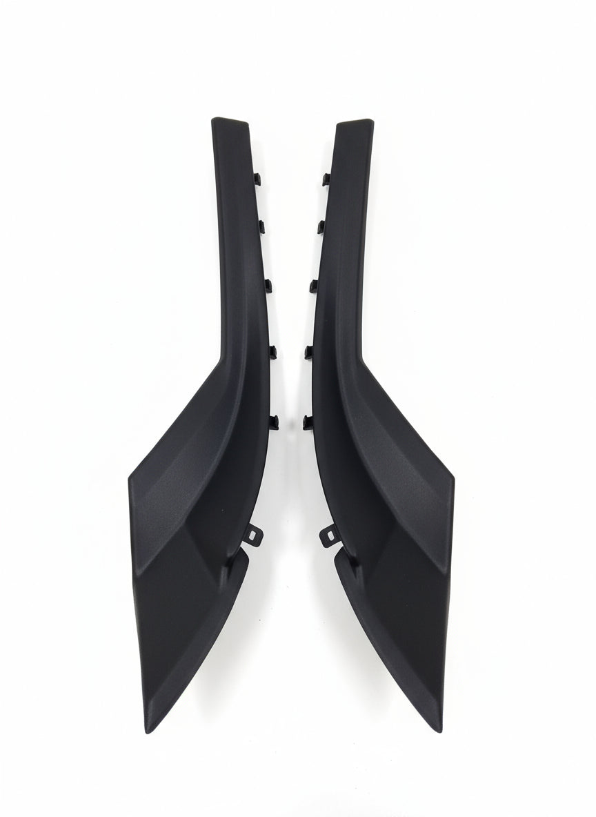 Two black car分流器 on a tiled floor