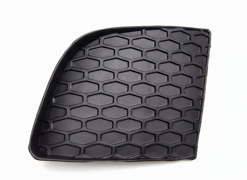 Black honeycomb-patterned tray on a marble surface