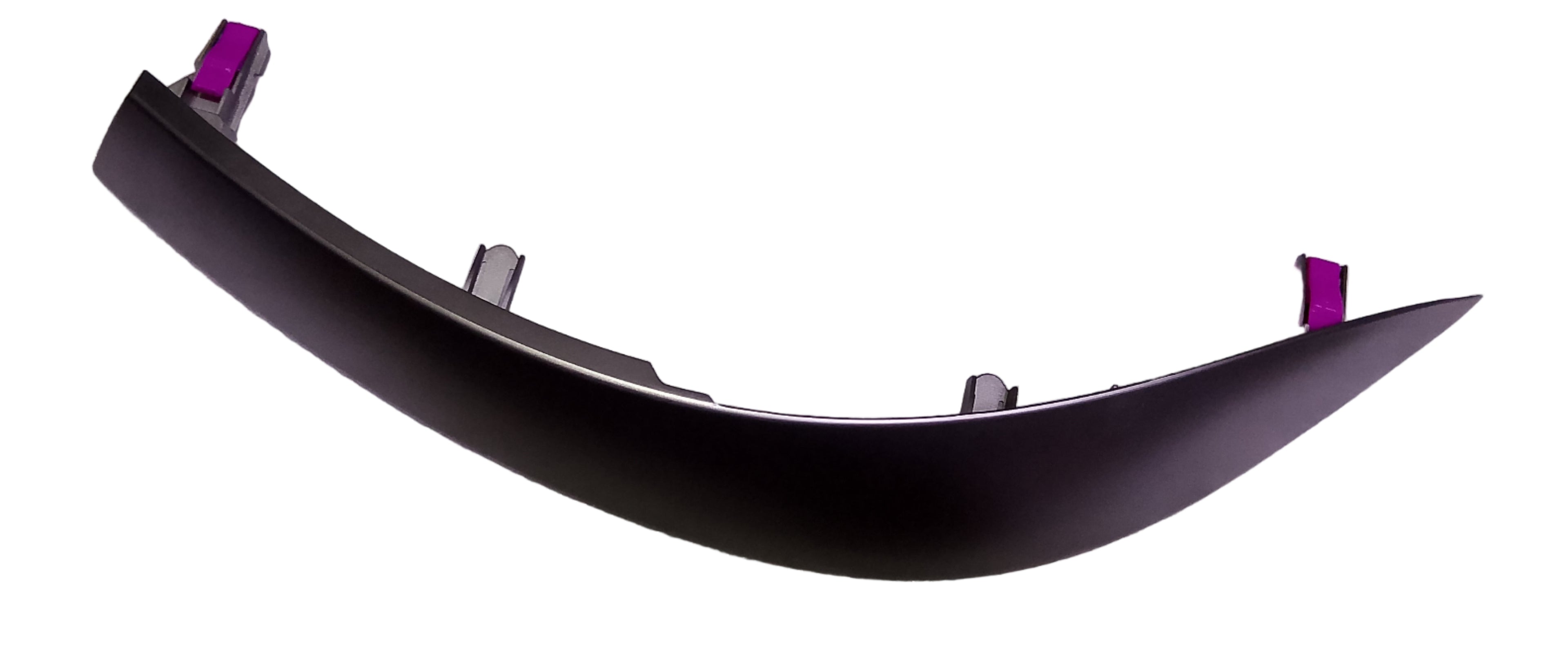 Curved metal object with purple markers on a marble surface