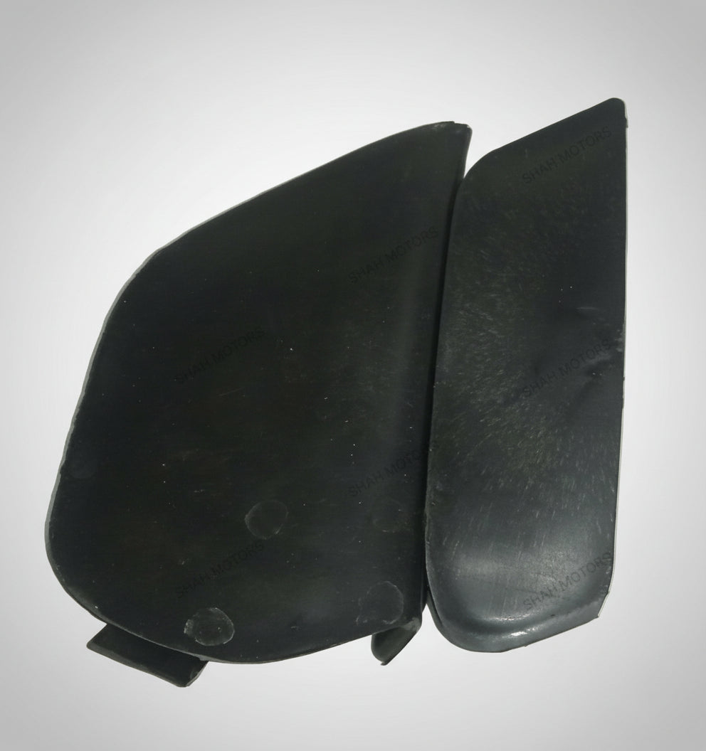 Two black car side mirrors on a light gray background
