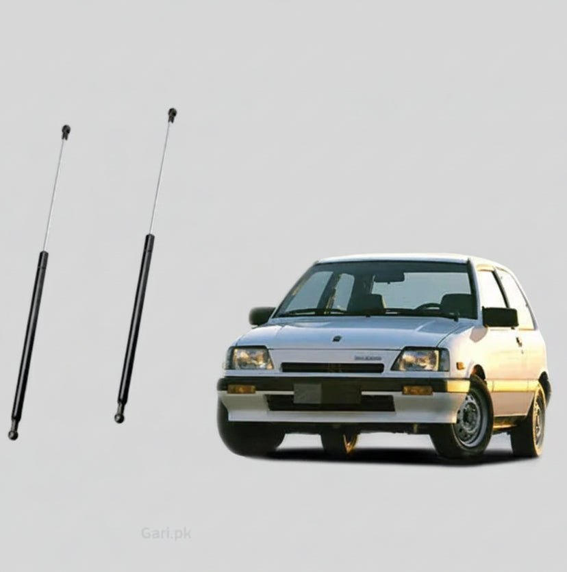 Two car antennas on a white background with a car partially visible.