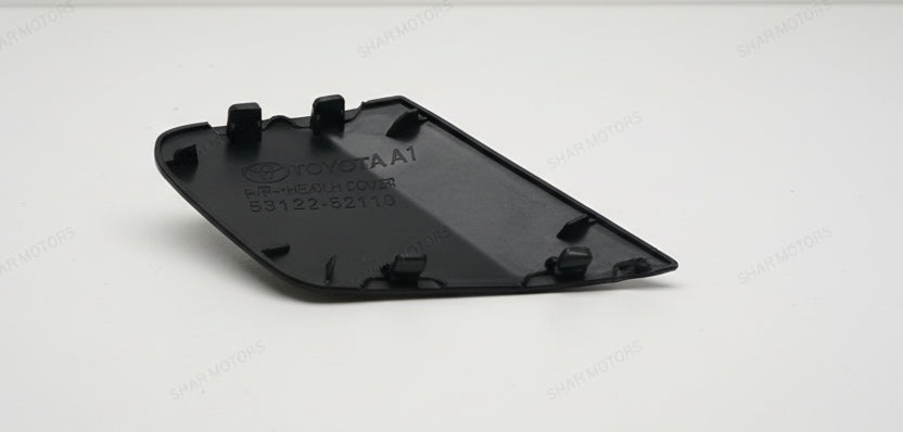 Black plastic component with Toyota branding on a white background