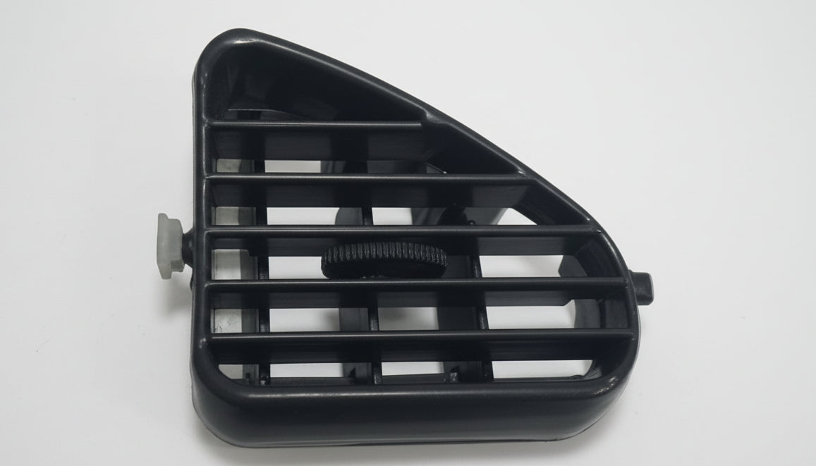 Black plastic grille on a white background
