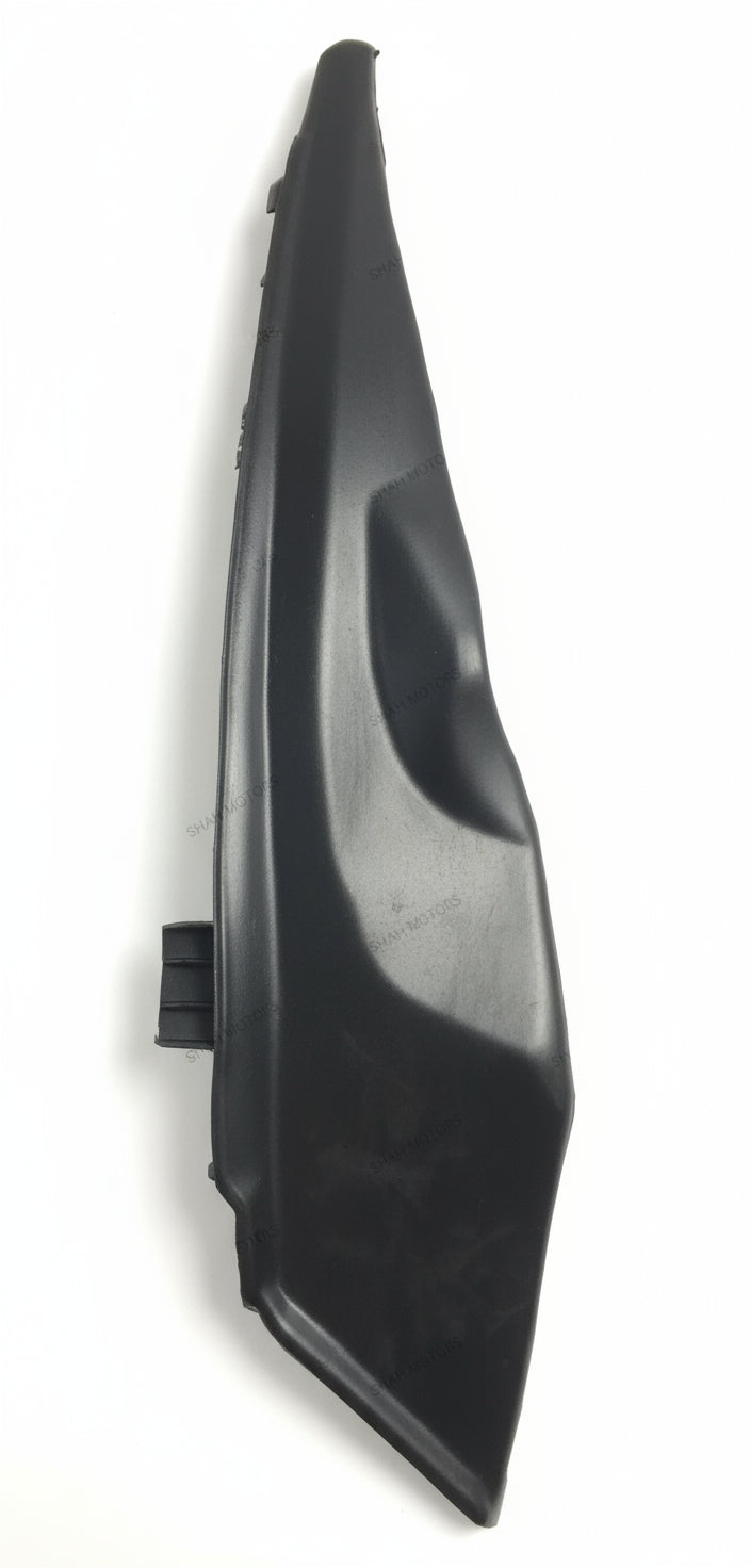 Black car headlight cover on a white background